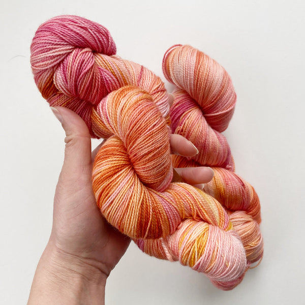 Pink Sunset Hand-Dyed Superwash Merino Sock Yarn