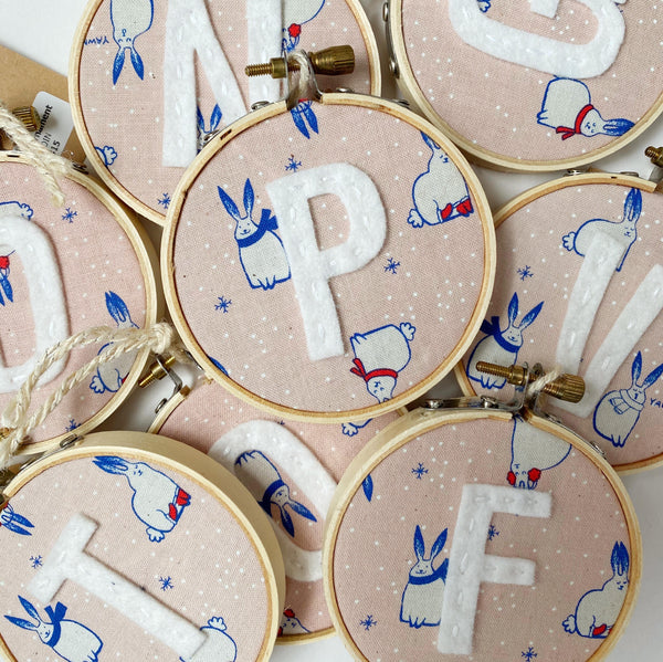 Initial Christmas Ornament - Pink Snow Bunnies fabric with whilte letter