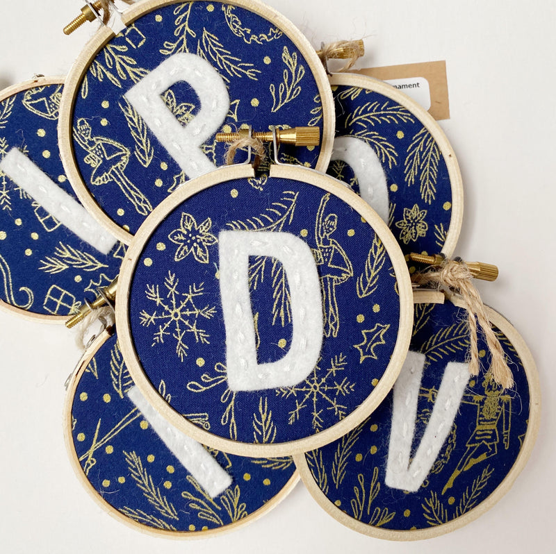 Initial Christmas Ornament - Nutcracker Blue fabric with white letter